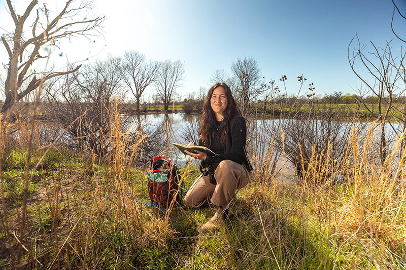 Student studying abroad and researching nature