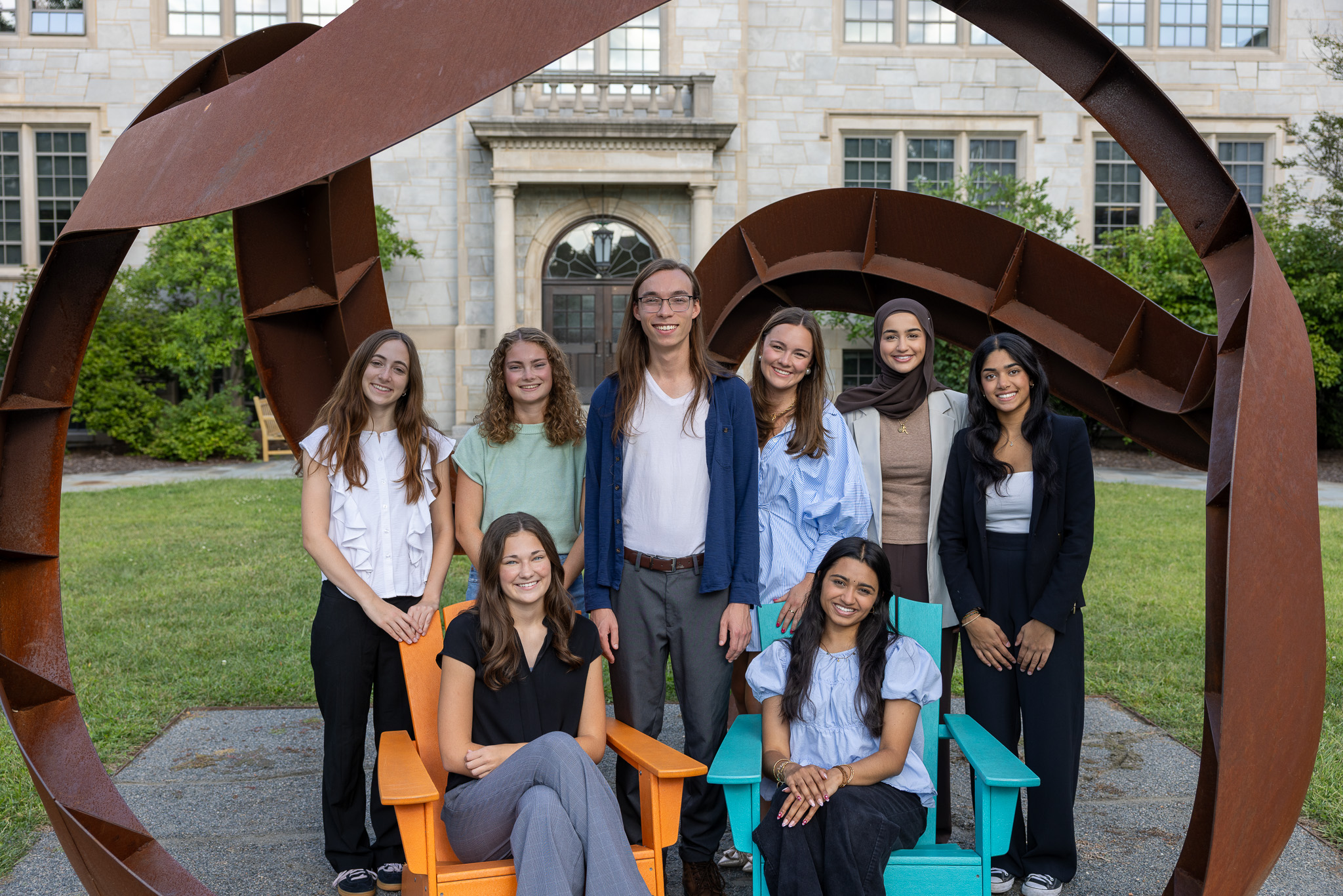 2025 Executive Board group photo under the Curvahedra sculpture