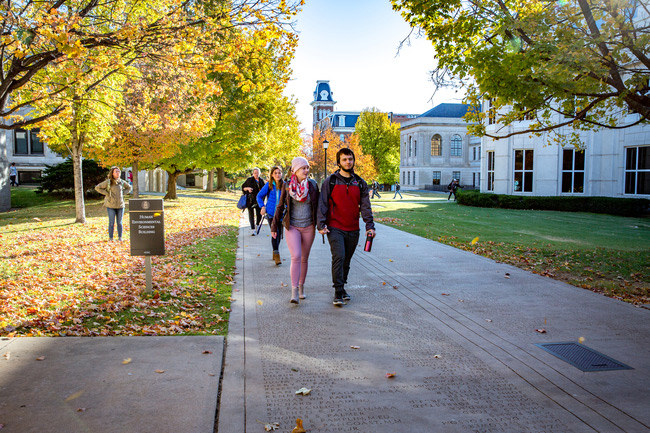 Students touring campus in the Fall