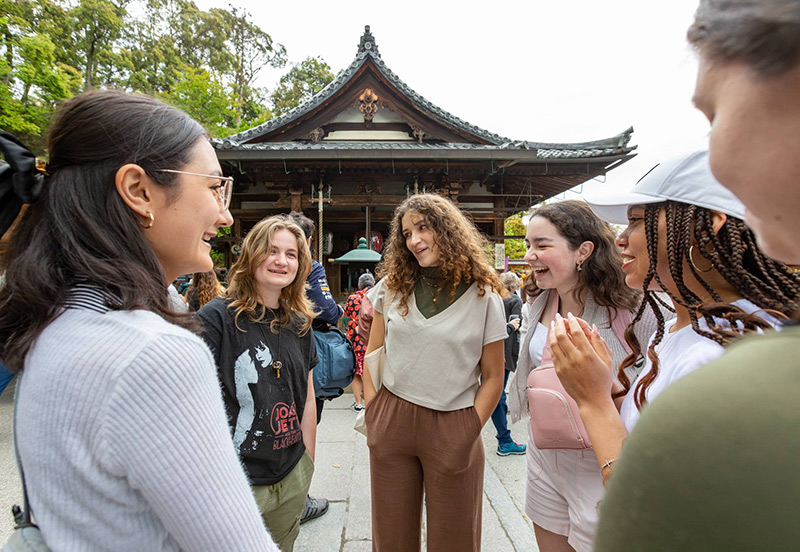 Students in front of a pagoda